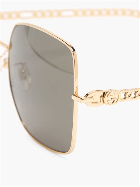 black and gold gucci square sunglasses